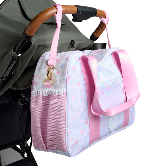 STATE x LoveShackFancy Bella Diaper Tote Confetti Bloom / Wildflower Blue on stroller