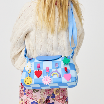 Girl wearing STATE Bags Chelsea Pouchette Charms Blue Check