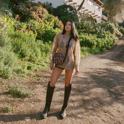 woman wearing STATE Bags Luna Mini Leopard