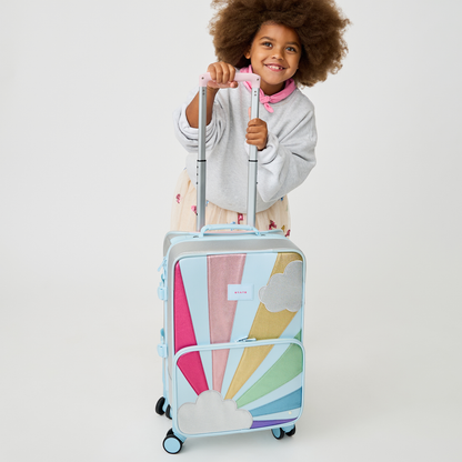 girl with STATE Bags Logan Carry-On Suitcase Rainbow Cloud