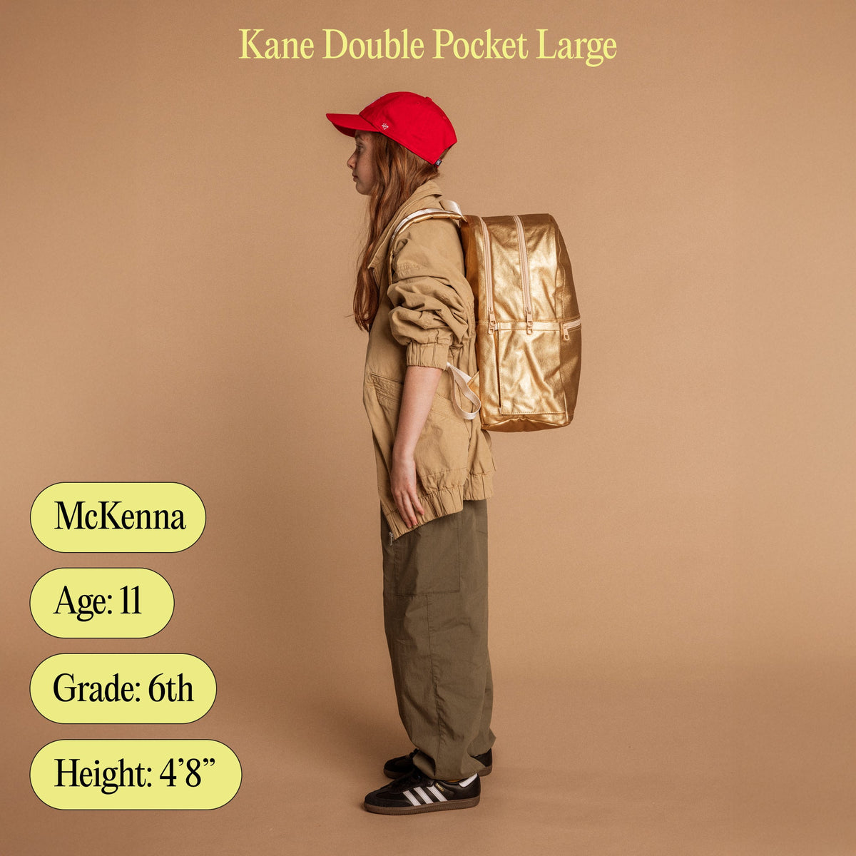Girl wearing kane double pocket large with age, grade, and height