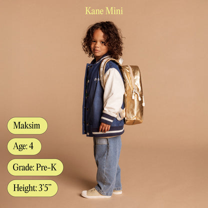 boy wearing kane mini gold with age, grade, and height for reference