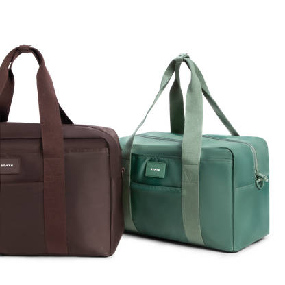 STATE Bags Wellington weekender regular and medium next to eachother