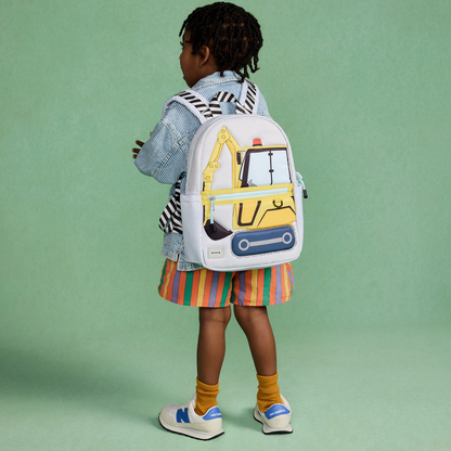boy wearing STATE Kane Mini Backpack construction