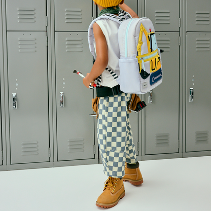 boy wearing STATE Kane Mini Backpack construction