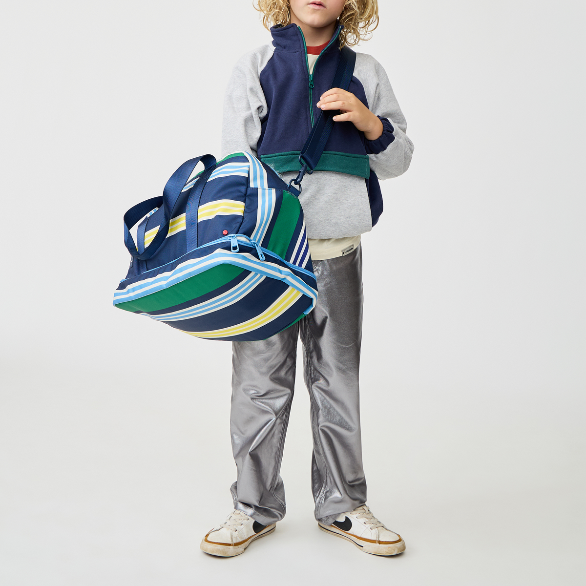 Boy Wearing Wren Weekender Polo Stripe